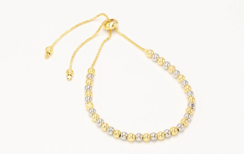 Pulsera bolitas color dorado y plata image number null