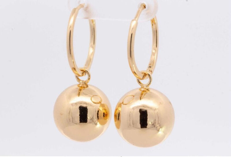 Arracadas grandes aprox.3cm de largo con bolita... image number null