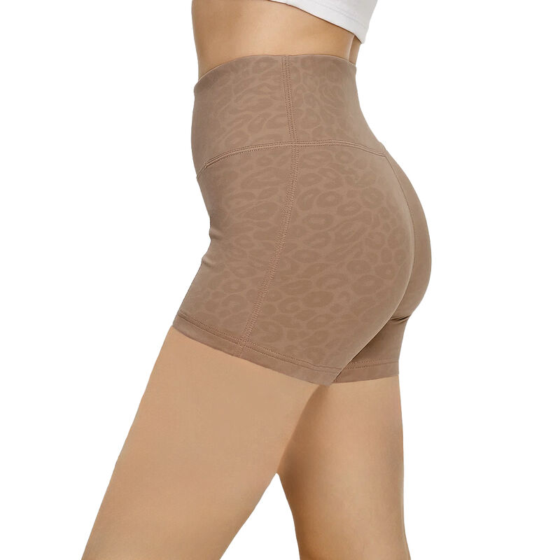 Short Wilson para entrenamiento mujer BEIGE CLA... image number null