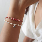 Pulsera perlas blancas con coraz&oacute;n de plata