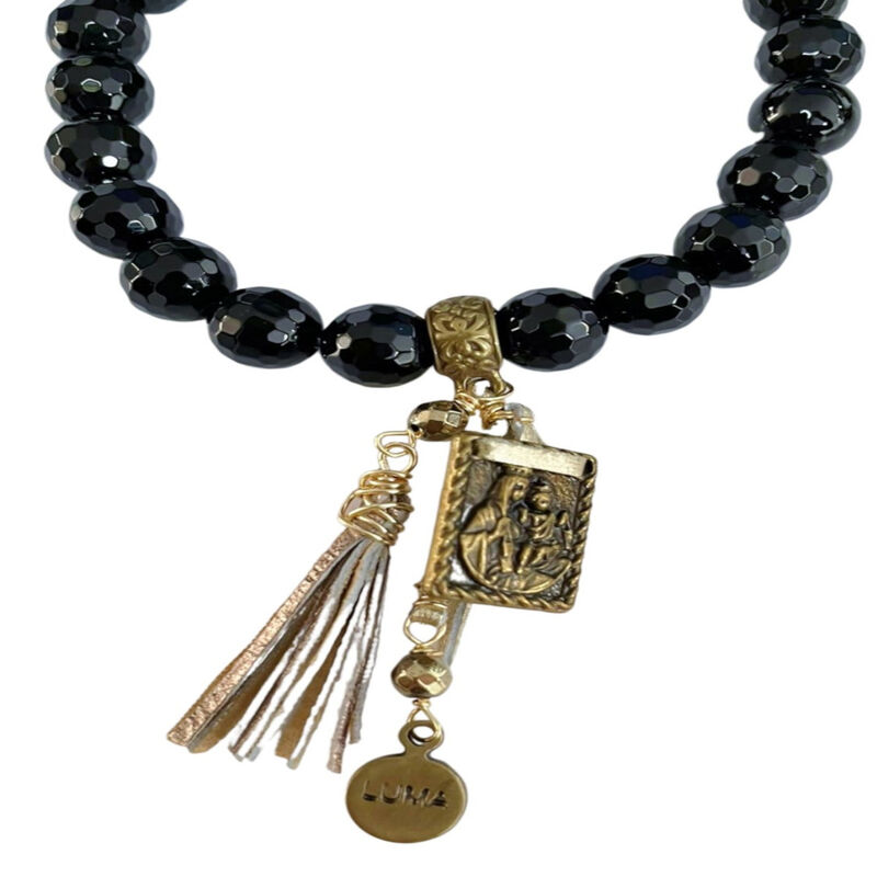 Pulsera Negra Con Escapulario De Metal y borla ... image number null